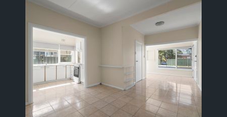SPACIOUS 3-BEDROOM HOME with HUGE YARD and REAR STREET ACCESS - Photo 2