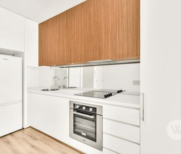 Sleek and Stylish City Apartment - Photo 6