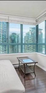 NW Corner Suite w/ Solarium at Prestigious Pointe Claire, Coal Harbour - Photo 3