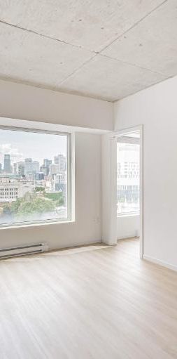 4 1/2 dans un projet locatif moderne à Place Gare Viger - Photo 1