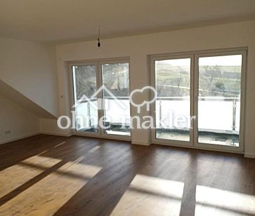 Gemütliche 4-Zimmer Neubauwohnung in KfW 55 KfW Effizienzhaus in He... - Photo 2