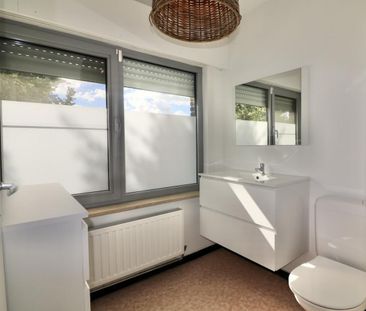 Centraal gelegen half-open bebouwing met 3 slpks, garage, tuin en t... - Photo 6