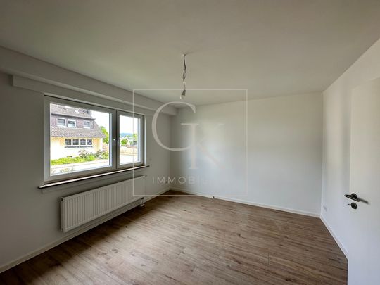 Erstbezug nach Modernisierung von lichtdurchfluteter großzügiger EG-Wohnung mit großem Süd-Balkon - Foto 1