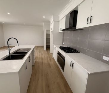Brand New 4x2 Family Home in Sought-After Ravenswood - Photo 3