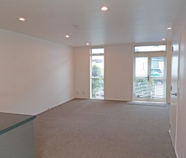Townhouse Living in fully gated complex with 2 carparks - Photo 3