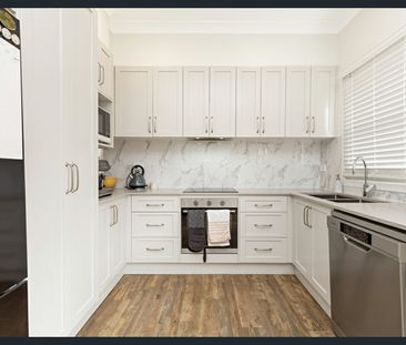 Stunningly Renovated Home with Large Backyard – A Must-See! - Photo 6