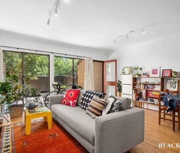 Convenient ground floor unit - Photo 1