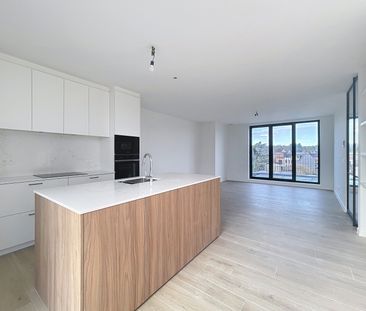 Nieuwbouw penthouse met 2 terrassen pal in het centrum - Photo 4