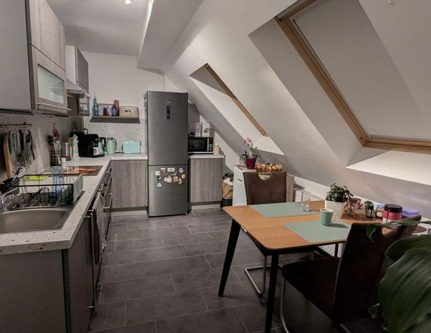 Wohnen im DG / Bad mit Eckwanne + Dusche / Carport u.v.m. - Photo 1