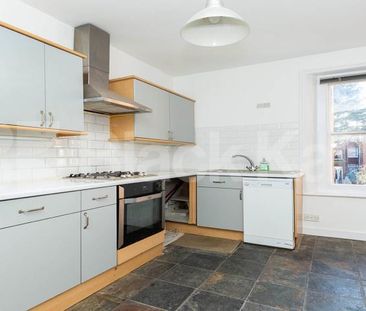 Stunning split level two bed with balcony and period features. - Photo 4