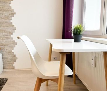 Modernes City-Apartment mit atemberaubender Skyline & Parkblick - Foto 3