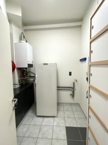 Gerenoveerd, instapklaar gelijkvloers appartement met 2 slaapkamers en staanplaats te Heverlee - Photo 4