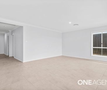 MODERN FAMILY HOME WITH QUALITY FINISHES AND LOW-MAINTENANCE LIVING - Photo 1