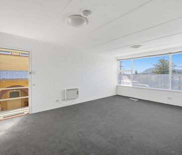 Charming & Convenient Unit in the Heart of New Town - Photo 1