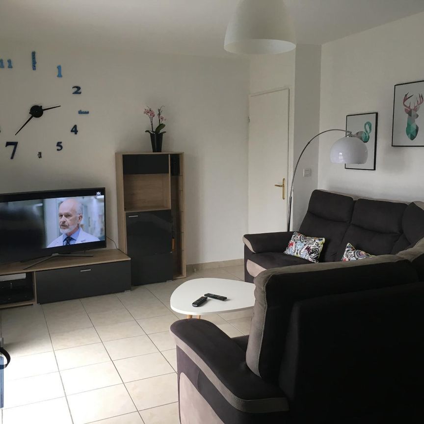 Location Appartement 3 pièces 57m² QUIEVRECHAIN 59920 - Photo 1