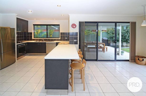WELL APPOINTED THREE BEDROOM HOME IN PRIME LOCATION! - Photo 1