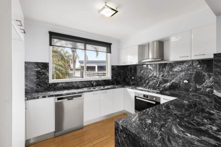 Stylish Family Home with Pool, Bar & Balcony in Prime Werribee Location! - Photo 5