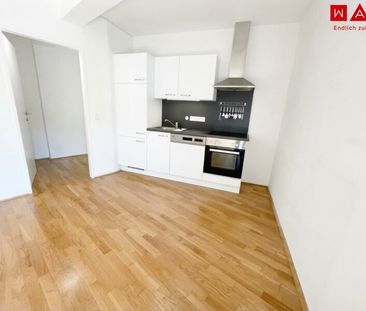 Wohnung mit großem Balkon in den Innenhof! - Foto 1