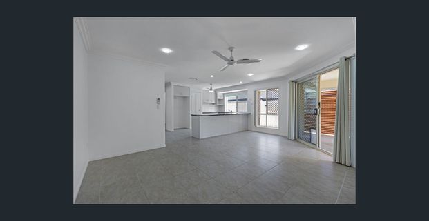 LARGE FAMILY HOME WITH DUCTED AIR CON AND FRESH PAINT! - Photo 1