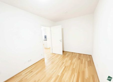 Tolle Aussicht – Moderne 2-Zimmer Wohnung mit Balkon nahe U1 - Photo 4