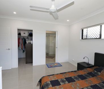 Modern Four-Bedroom Family Home in Prime Location - Photo 3