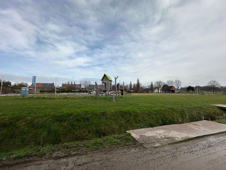 Lichtrijke woning gelegen in gezellige buurt - Photo 2