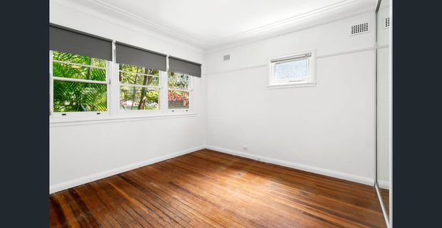 Walk to the beach from this beauty - Photo 1