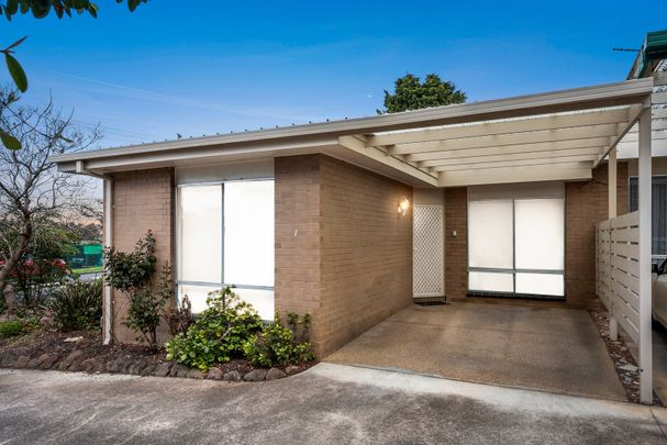 Comfortable and in a great location - Photo 1