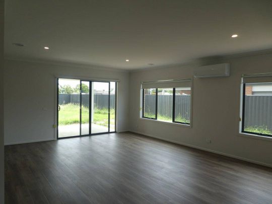 BRAND NEW PROPERTY WITH 2 MASTER SUITES, 2 LOUNGES! - Photo 1