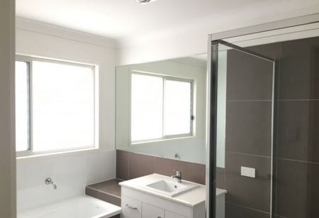 Modern Family Home with Multiple Living Areas in Convenient Bellbird Park Location - Photo 3