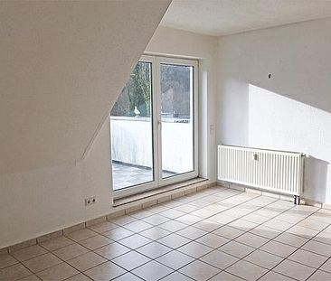 Dachgeschosswohnung mit Extras! - Foto 1
