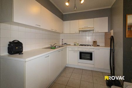 Centraal gelegen gelijkvloers appartement met terras! - Photo 4