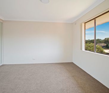 Top Floor Apartment In Sort After Location - Photo 2