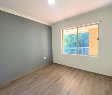 SPACIOUS AND MODERN TOP FLOOR APARTMENT - Photo 2