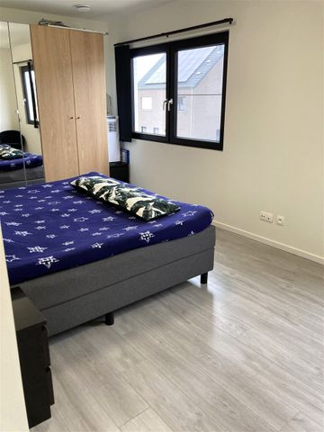 Energiezuinige woning uitgerust met zonnepanelen en warmtepomp en met 3 slaapkamers en afgesloten tuin - Foto 2