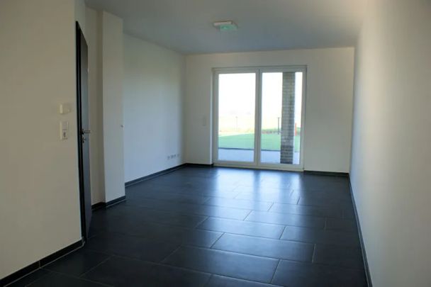Erdgeschosswohnung mit Einbauküche, Erdwärme und Garten mit unbezahlbarem Blick - Photo 1