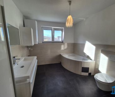 Terrassen-Wohnung im Erdgeschoss mit Einbauküche und bis zu zwei PK... - Foto 6