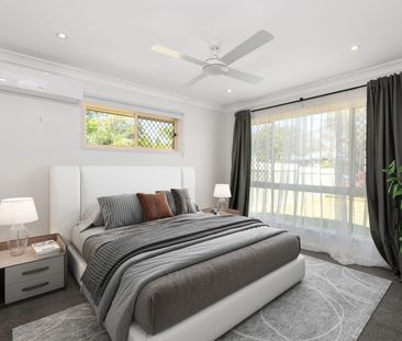 Expansive Fully Renovated Lowset Home - Photo 6