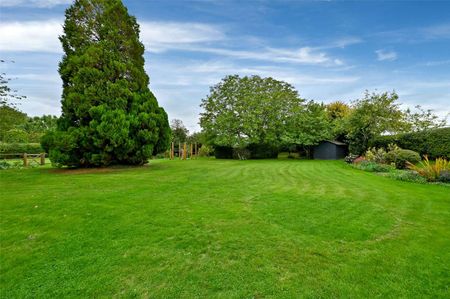A beautifully presented detached home with private driveway, double garage and fully furnished interiors including five bedrooms in village setting - Photo 3