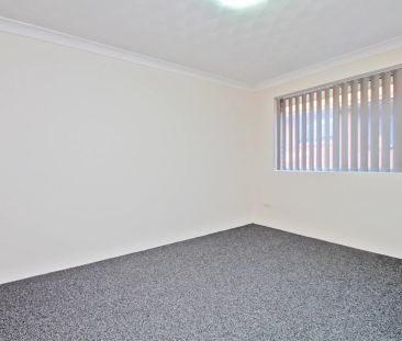 VALUE PACKED TWO-BEDROOM APARTMENT! - Photo 3