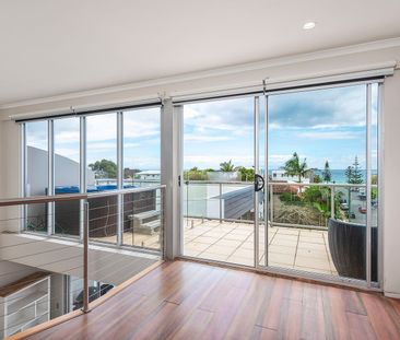 Elevated Coastal Lifestyle moments from the beach - Photo 2