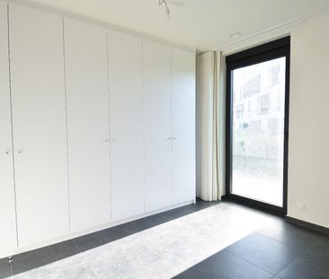 Luxueus gelijkvloers appartement met tuin, garage en 2 slaapkamers ... - Foto 1