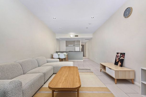 Furnished Split-Level Apartment with Study I Ducted A/C & Balcony in Prime Inner-City Spot - Photo 1