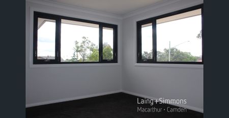 Brand New - 4 Bedroom + Multiple Living Areas + Large Yard - Photo 5