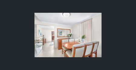 Spacious and stylish, this three-bedroom home offers modern comfort and an unbeatable location just minutes from the coast. - Photo 3