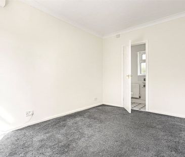 A three bedroom detached bungalow situated within the Village of Bu... - Photo 3