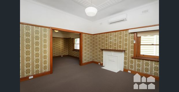 UPDATED HOME WITH DOUBLE GARAGE! - Photo 1