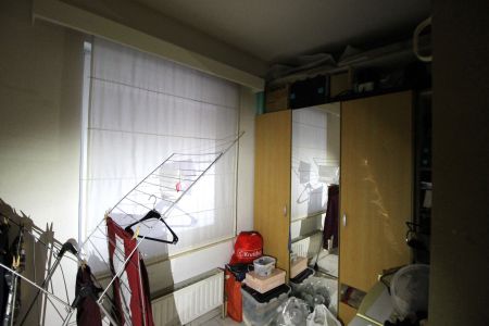 Een gelijkvloers appartement met 2 slaapkamers, tuin en garage. - Foto 3