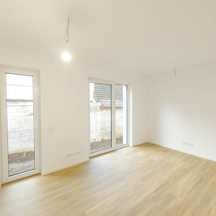 Attraktive Neubauwohnung mit Gartenanteil in ruhiger Lage! - Photo 1