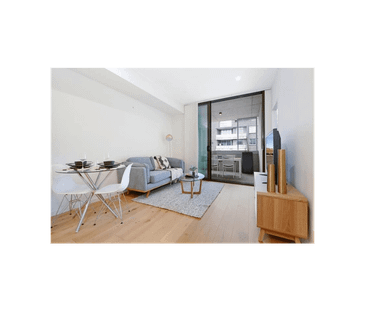 MODERN, TOP FLOOR UNIT WITH VIEWS AND EXCELLENT STORAGE SPACE! - Photo 1